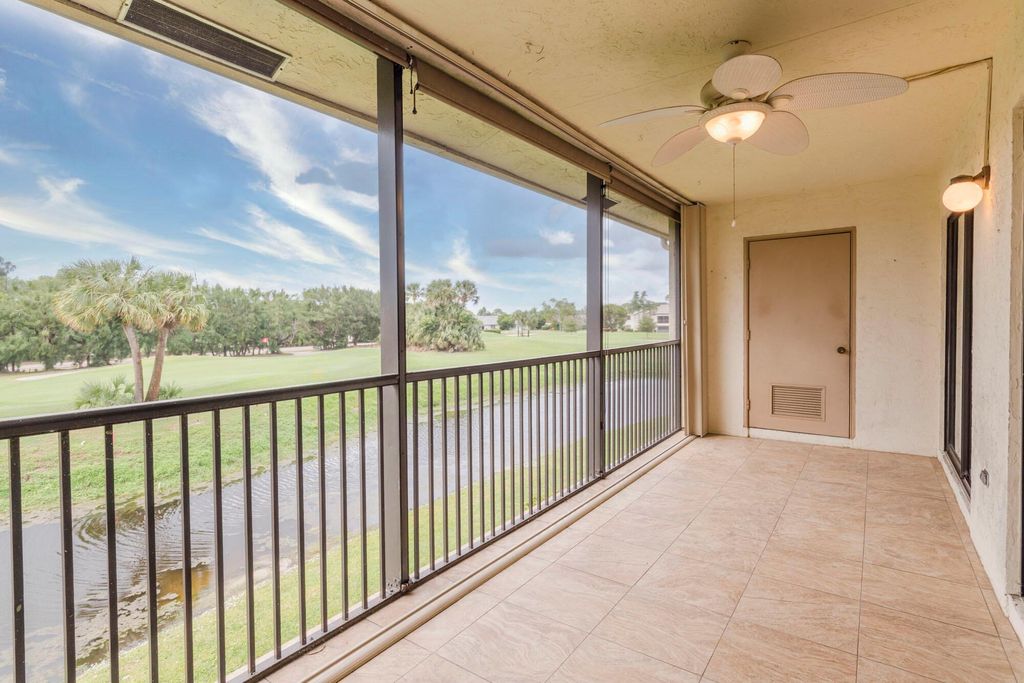 Photo of 402 Pinecrest Circle #D, Jupiter, FL 33458 (MLS # R11064399)