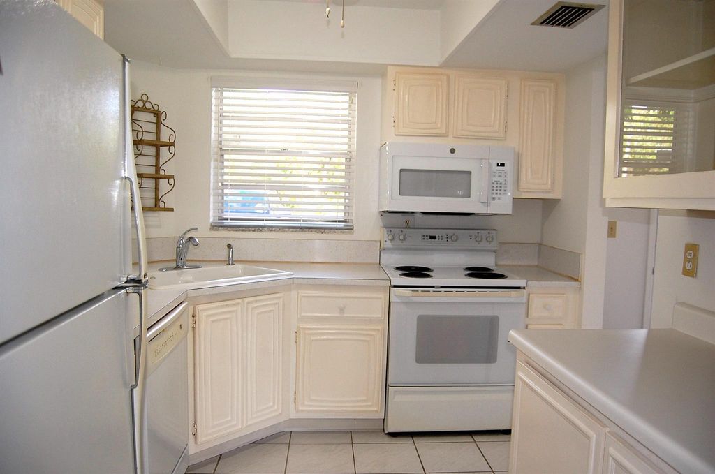 Photo of 18081 SE Country Club Drive #11-104, Tequesta, FL 33469 (MLS # R11061656)