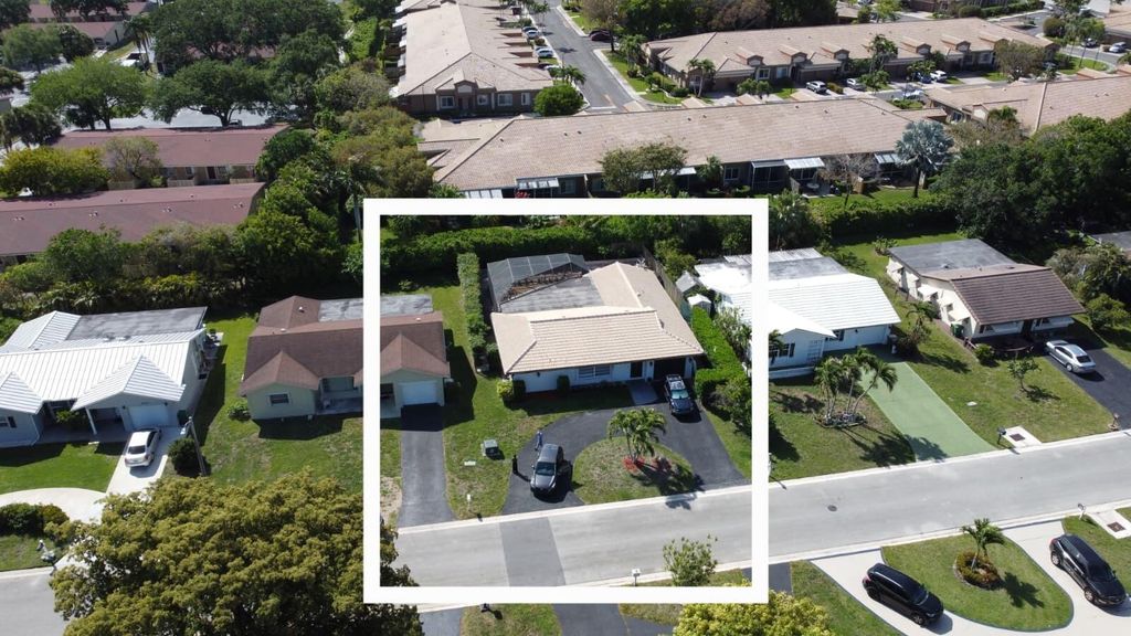 Photo of 8018 NW 100th Terrace, Tamarac, FL 33321 (MLS # B26018921)