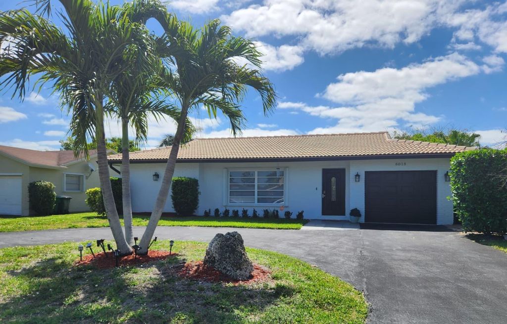 Photo of 8018 NW 100th Terrace, Tamarac, FL 33321 (MLS # B26018921)