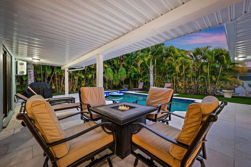 Photo of 1120 Singer Drive, Riviera Beach, FL 33404 (MLS # R11169343)