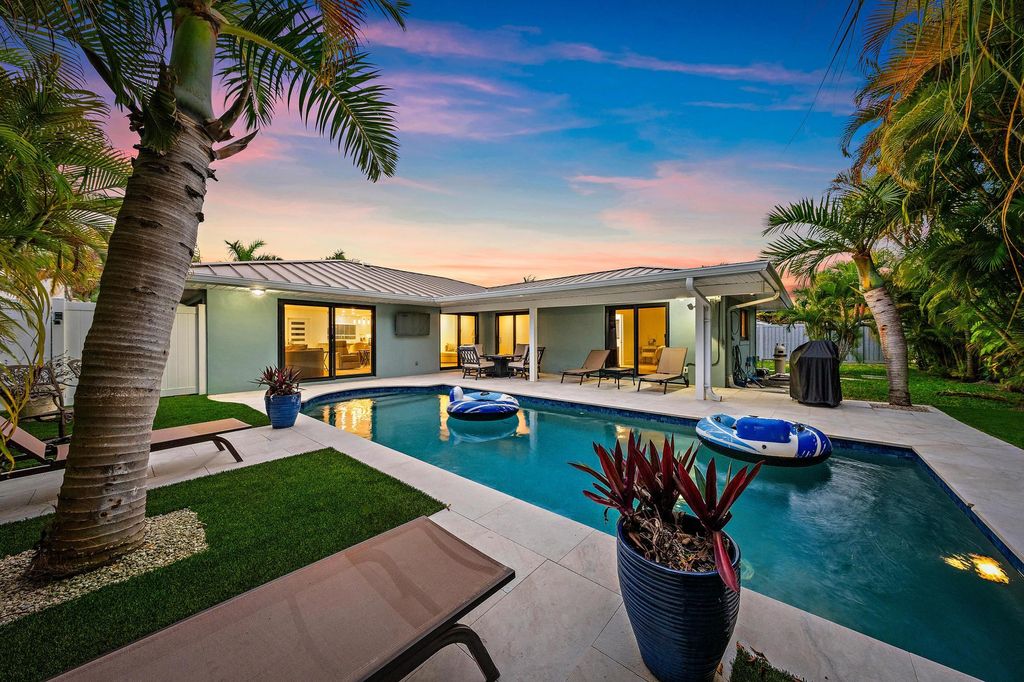 Photo of 1120 Singer Drive, Riviera Beach, FL 33404 (MLS # R11169343)