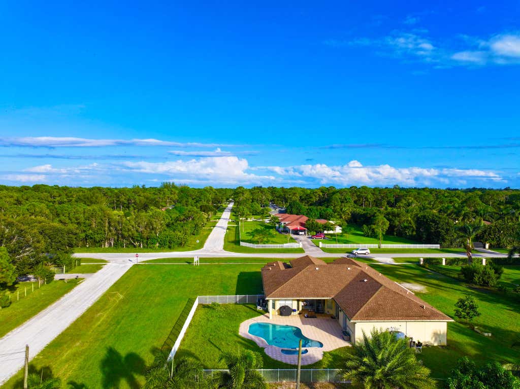Photo of 6613 Hall Boulevard, The Acreage, FL 33470 (MLS # B26038134)