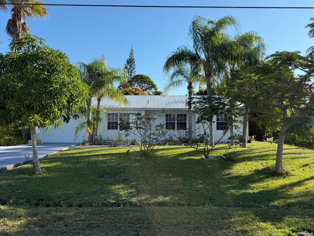 Photo of 2451 SE Berkshire Boulevard, Port Saint Lucie, FL 34952 (MLS # R11149772)
