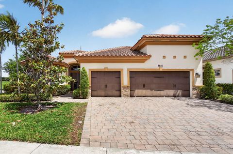 Photo of 8850 Miralago Way, Parkland, FL 33076 (MLS # B26018746)
