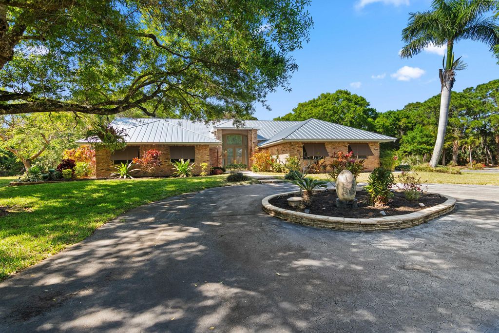 Photo of 8850 Hidden Pines Road, Fort Pierce, FL 34945 (MLS # R10964759)