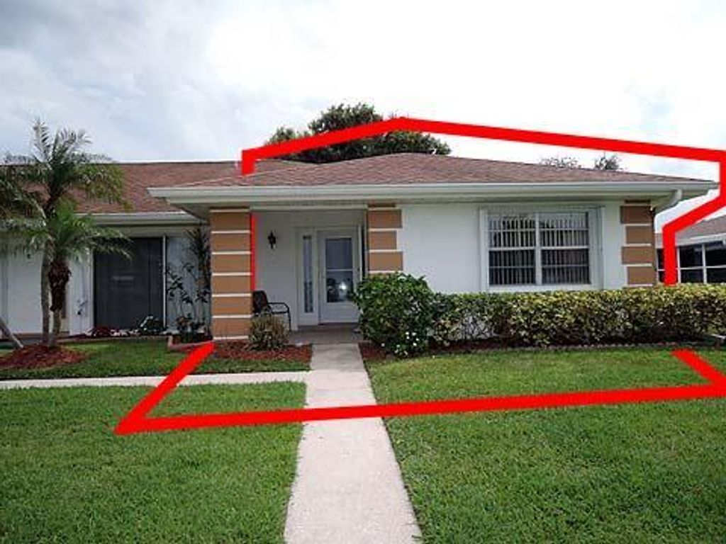 Photo of 1005 Pheasant Run Drive #Apt D, Fort Pierce, FL 34982 (MLS # R10793431)