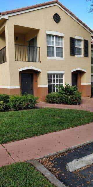 Photo of 10282 S Fox Trail Road #212, Royal Palm Beach, FL 33411 (MLS # R11030846)