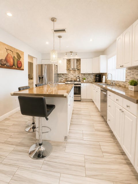 Tiny photo for 10720 NW 26TH Place, Sunrise, FL 33322 (MLS # B26069365)