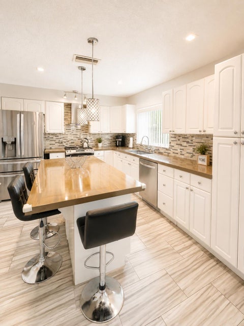 Tiny photo for 10720 NW 26TH Place, Sunrise, FL 33322 (MLS # B26069365)