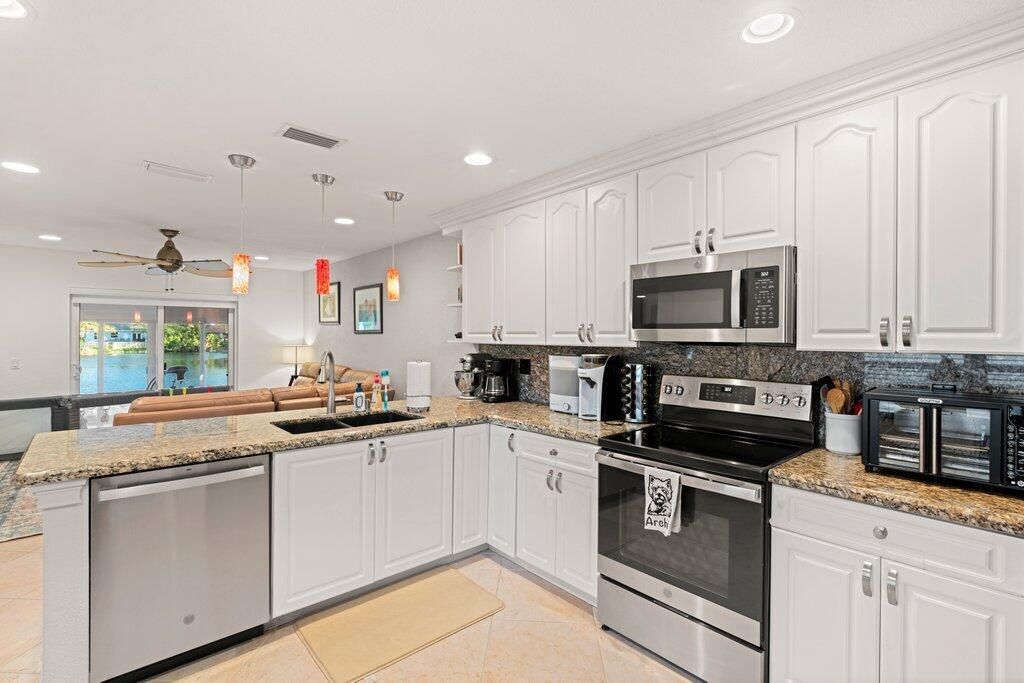 Photo of 288 NW 39th Way, Deerfield Beach, FL 33442 (MLS # R11144420)