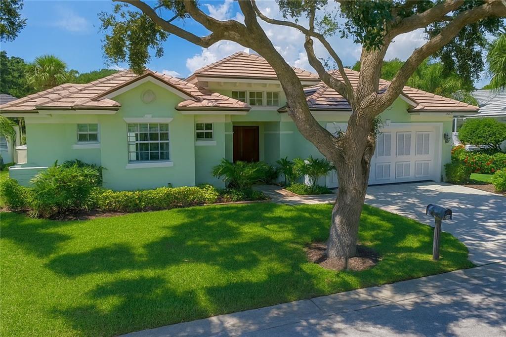 Private Caribbean West Indies-style home in Bermuda Club with 2,728 A/C sq ft. Features 2025 courtyard pool, 2024 tile roof, impact windows/doors, butcher block counters, stainless appliances, wood & tile floors, crown molding, 12' ceilings, jetted tubs & walk-in shower. Enjoy direct access to the Jungle Trail along the Indian River, deeded ocean access, and a large homesite in this exclusive coastal enclave.