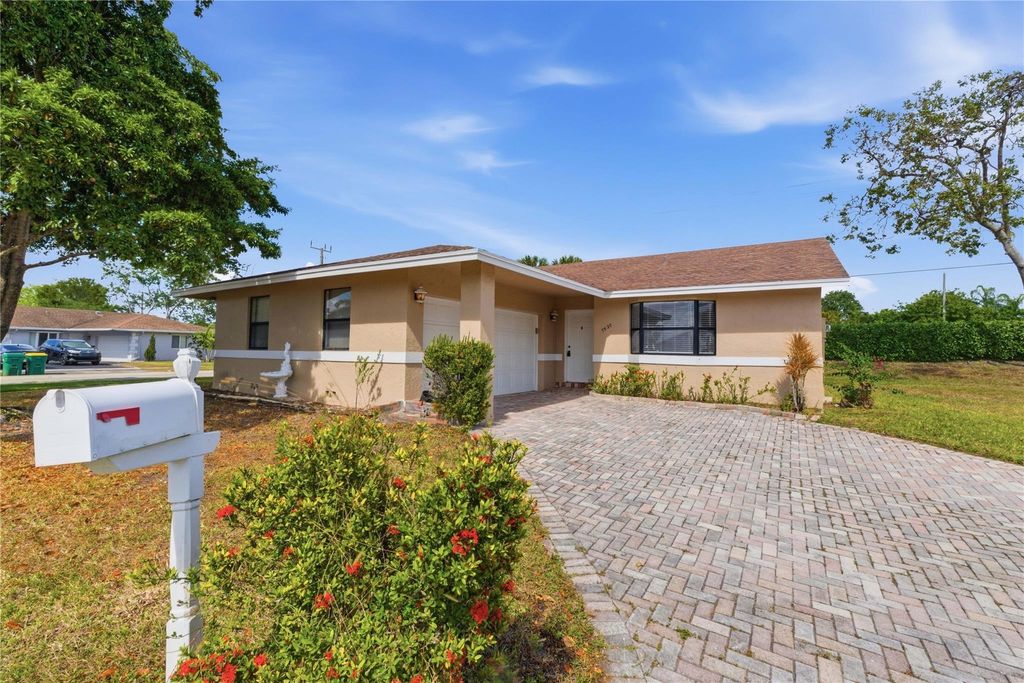 Photo of 7520 NW 88th Terrace, Tamarac, FL 33321 (MLS # F10556079)