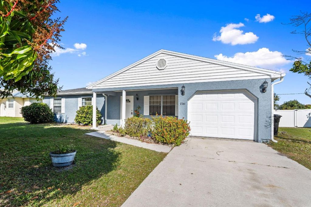 Photo of 2361 SE Bounty Avenue, Port Saint Lucie, FL 34952 (MLS # R11154188)