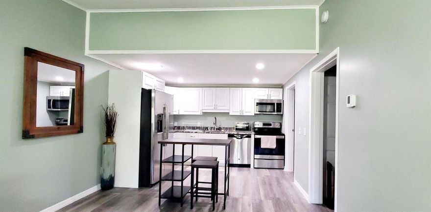 LOCATION LOCATION LOCATION!!! Vero Beach's finest and NO HOPA/Rental for all qualified ages. You can walk/bike to Lagoon Greenway by the river. Walk to gym, bridge to Hutchison Island, bike everywhere, close to restaurants, retail shops. Nicely SEMI - FURNISHED, updated, beautiful, clean, END UNIT, very well taken care of, open floorplan, LARGE one bedroom, one bath, laundry room with washer/dryer. LARGE screened in porch with ceiling fan perfect for you to relax in also has an updated landscaping outside of IT. WATER/SEWER  included. First, Last, Security Deposit, non-refundable pet fee, Renter's Insurance upfront.