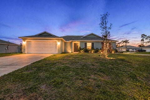 Photo of 1220 SE NAVAJO Lane, Port Saint Lucie, FL 34983 (MLS # B26054248)