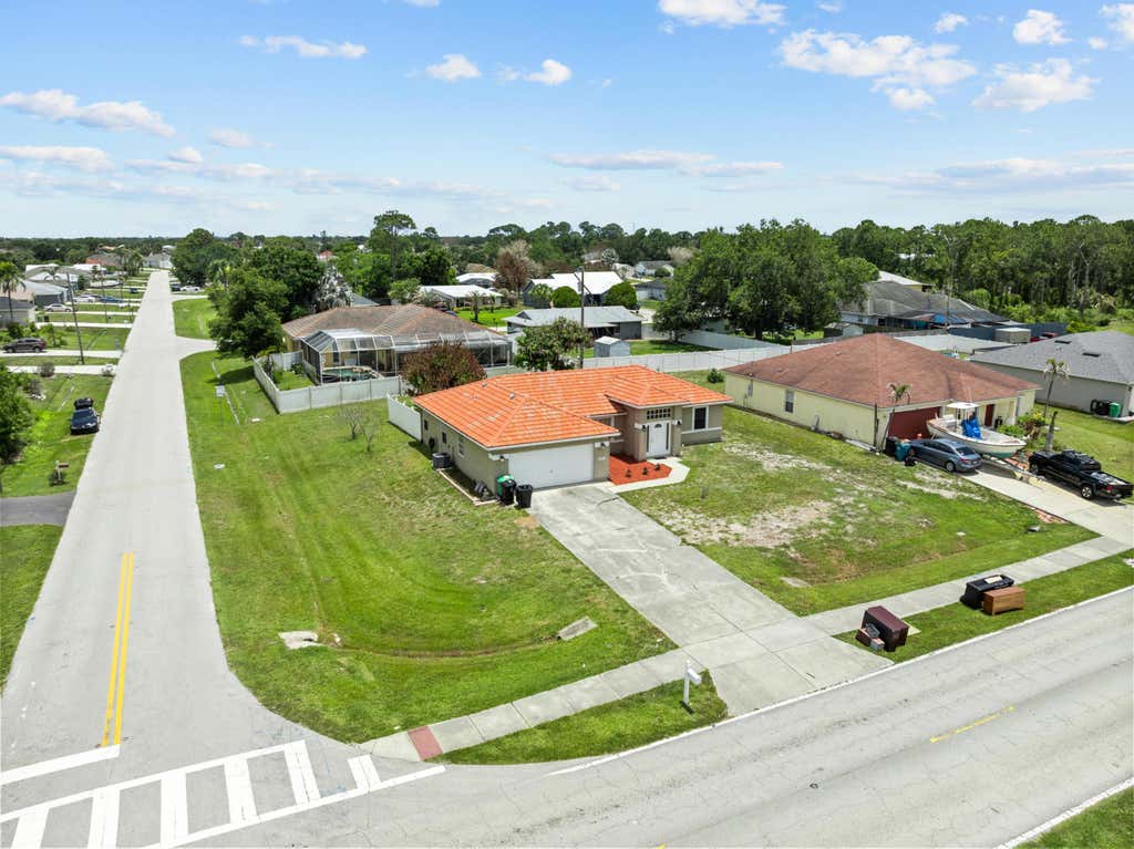 Photo of 1701 SW Cashmere Boulevard, Port Saint Lucie, FL 34953 (MLS # B26033654)