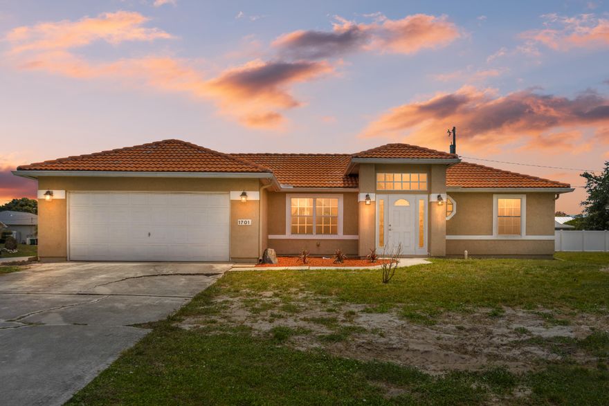 This 1358 sq ft. 3 bedroom, 2 bath home with a 2 car garage located on a spacious corner parcel. This is the one you have been looking for! Step inside to discover a bright and airy layout featuring vaulted ceilings, a desirable split bedroom design, and an inviting living area ideal for everyday living and entertaining.  Newer AC installed in 2018, water heater replaced in 2022, and a long-lasting tile roof from 2005. The bathrooms have also been tastefully refreshed. Out back enjoy a generously sized yard with mature fruit trees, full rain gutter system, and ample space to create your dream pool area. Perfectly positioned near dining, shopping, schools, and quick access to US-1, I-95, and the Florida Turnpike. Don't miss this opportunity call me today for additional details!