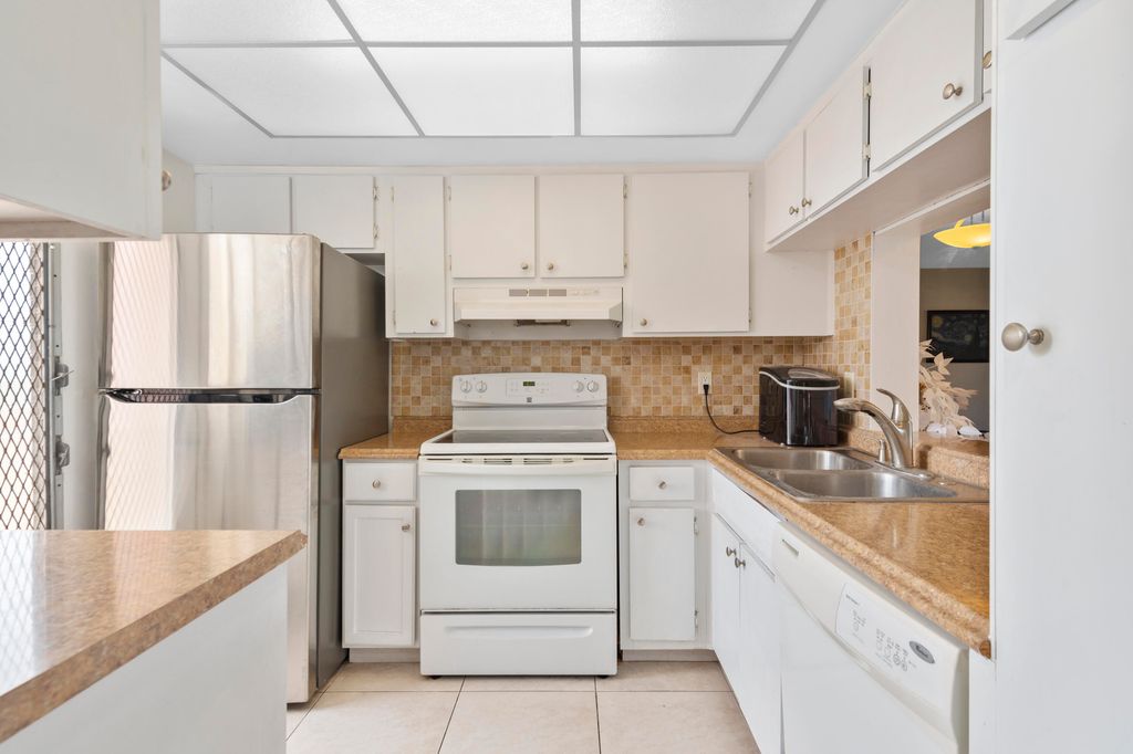 Photo of 1101 Crystal Lake Drive #309, Deerfield Beach, FL 33064 (MLS # B26009947)