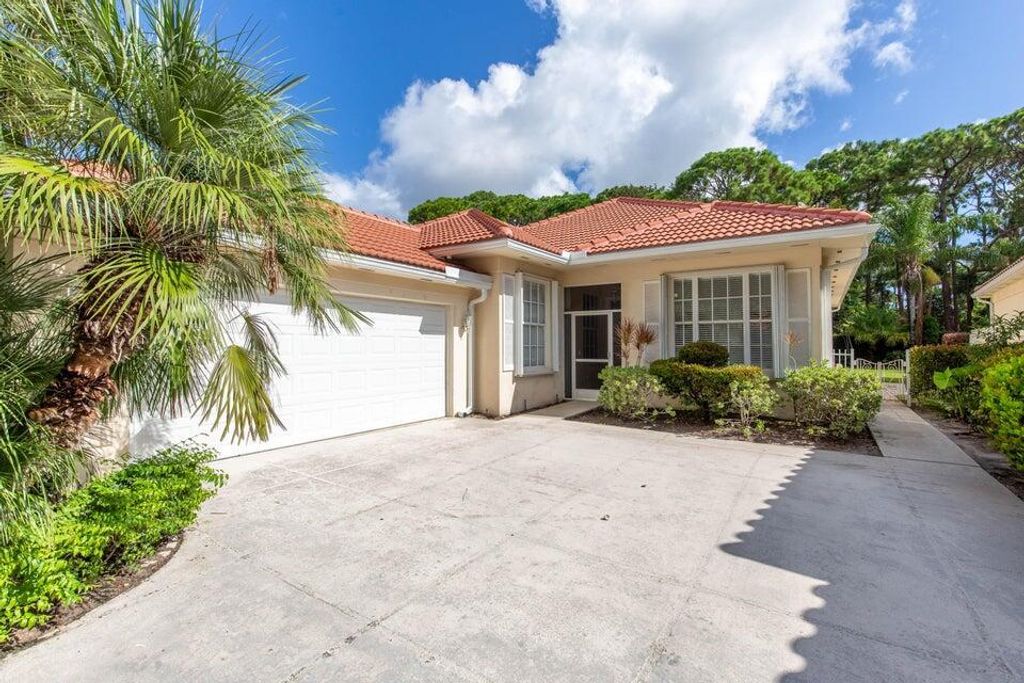 Photo of 179 E Tall Oaks Circle, Palm Beach Gardens, FL 33410 (MLS # R11126410)