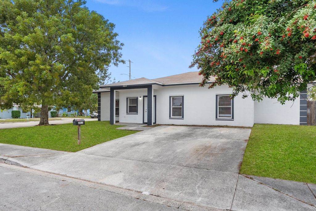 Photo of 3011 Avenue M, Riviera Beach, FL 33404 (MLS # R11153864)