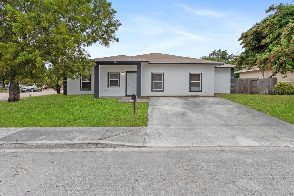 Photo of 3011 Avenue M, Riviera Beach, FL 33404 (MLS # R11153864)