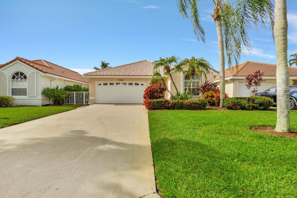 Photo of 2300 SW Shoal Creek Trace, Palm City, FL 34990 (MLS # R11018587)