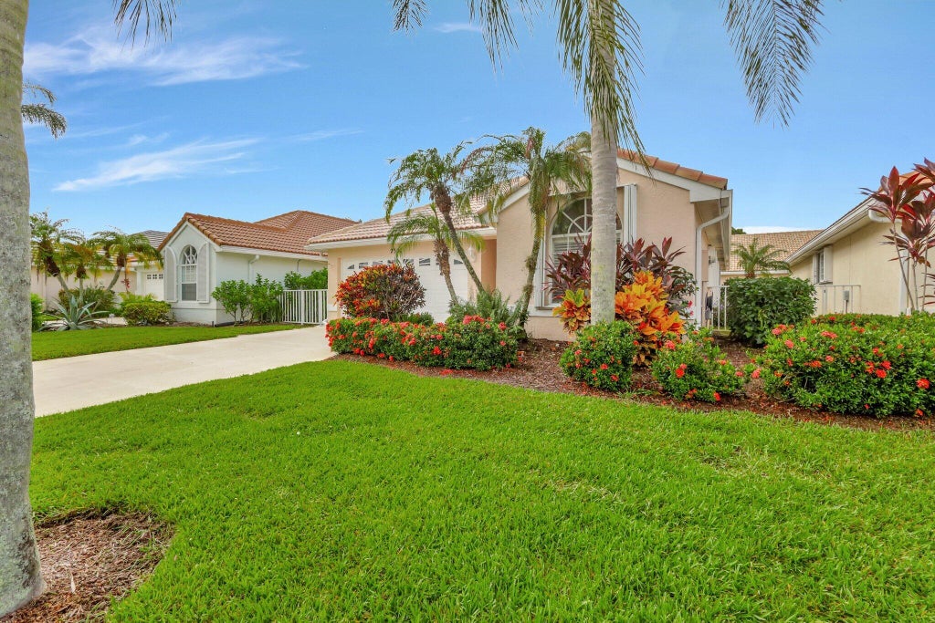 Photo of 2300 SW Shoal Creek Trace, Palm City, FL 34990 (MLS # R11018587)