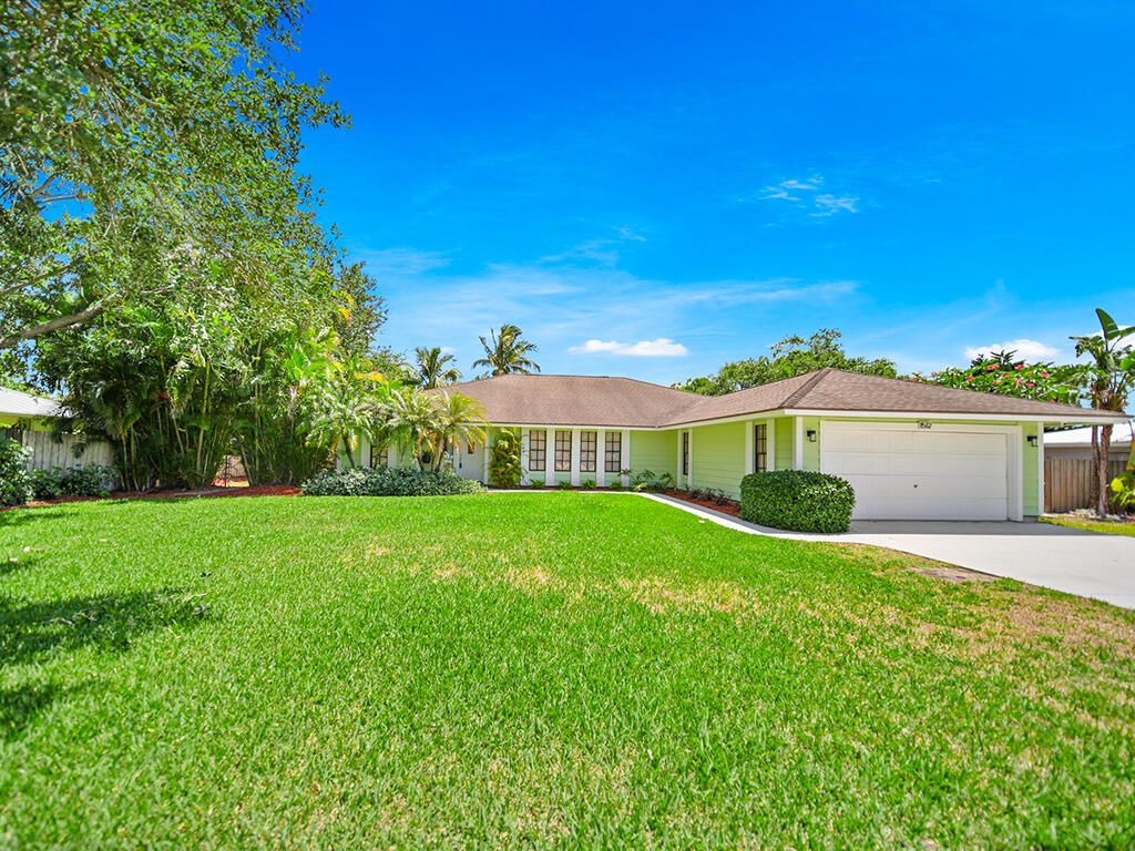 Photo of 1512 NE South Street, Jensen Beach, FL 34957 (MLS # R10986117)