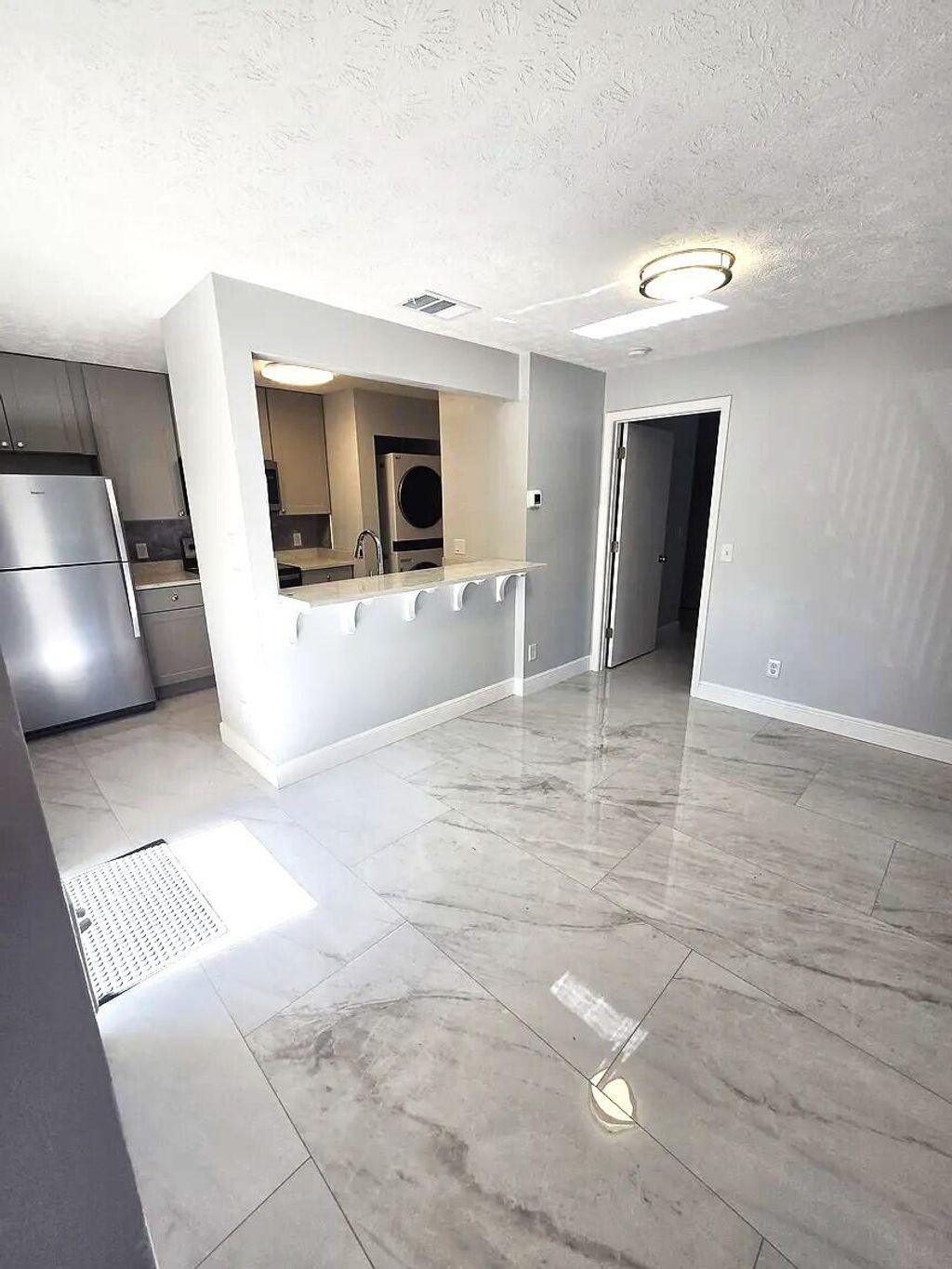 Photo of 6551 SE Federal Highway #104, Stuart, FL 34997 (MLS # B26024948)