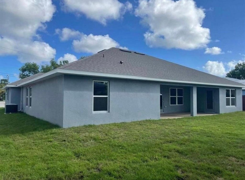 Photo of 5237 NW Reba Circle, Port Saint Lucie, FL 34986 (MLS # R10994544)