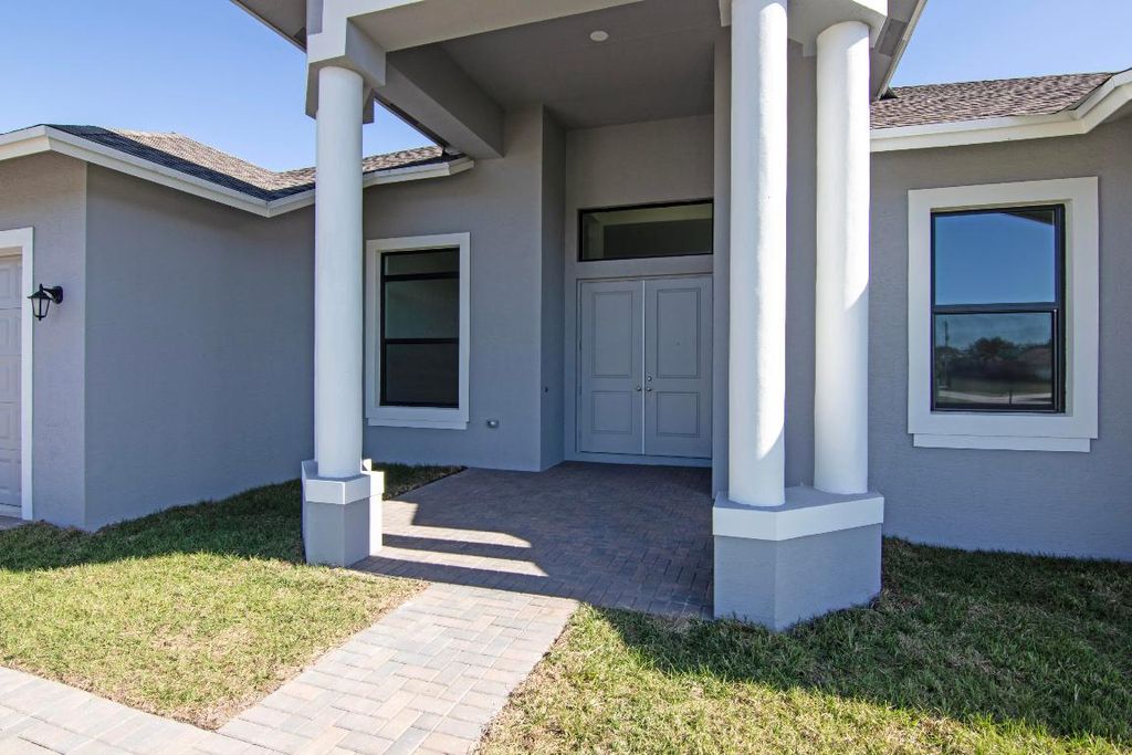 Photo of 4689 SW Tacoma Street, Port Saint Lucie, FL 34953 (MLS # R11153998)