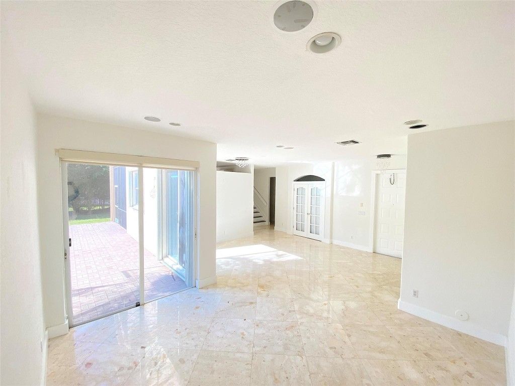 Photo of 5830 NW 119th Drive, Coral Springs, FL 33076 (MLS # F10508560)