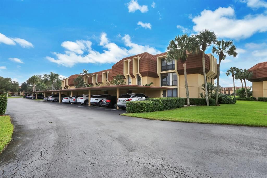 Photo of 5344 Woodland Lakes Drive Dr #220, Palm Beach Gardens, FL 33418 (MLS # R10679090)