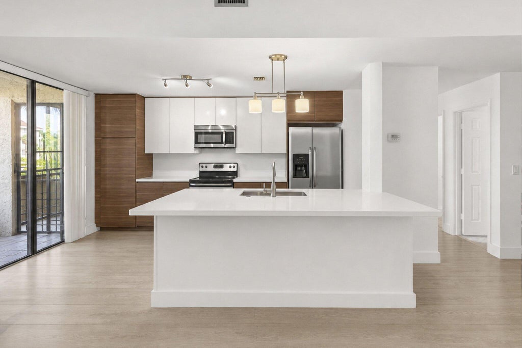 Photo of 7535 La Paz Boulevard #209, Boca Raton, FL 33433 (MLS # B26065480)