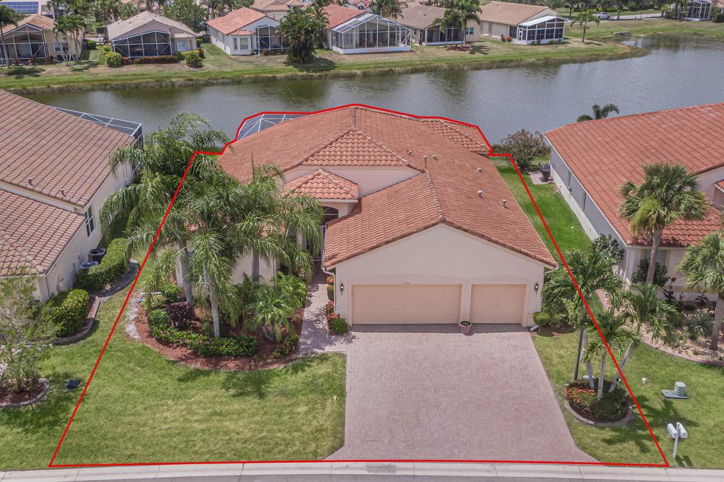 Photo of 520 NW Blue Lake Drive, Port Saint Lucie, FL 34986 (MLS # R10995225)