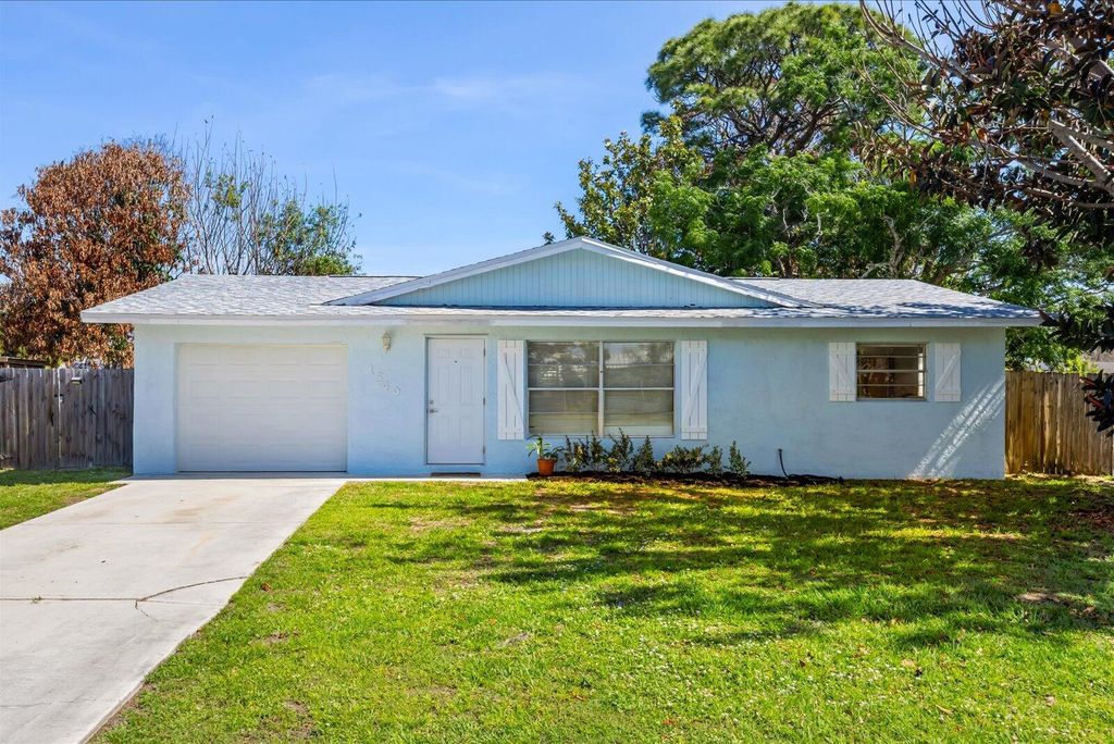 Photo of 1549 SE Minorca Avenue, Port Saint Lucie, FL 34952 (MLS # B26026634)