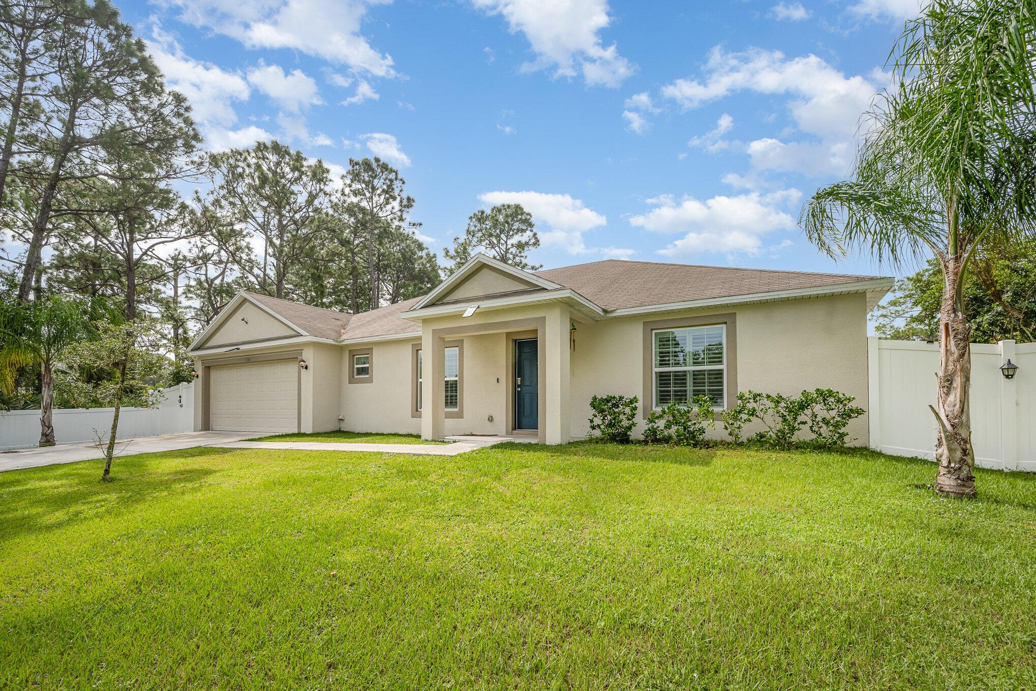 Welcome to 1544 Summit Road, a prime investment opportunity in the heart of Palm Bay. This spacious 3-bedroom, 2-bath home offers over 2,000 sq ft of modern living with upgraded flooring, stylish countertops, and a desirable split-bedroom floor plan. A long-term tenant is already in place, providing immediate rental income for savvy investors. Built in 2019 and located on a quiet street, the home also features a massive fenced backyard--perfect for outdoor living or future enhancements. With a 2-car garage, central air, and a beautifully maintained interior, this property is both low-maintenance and high-return. Don't miss this turnkey opportunity to add a strong performer to your portfolio!
