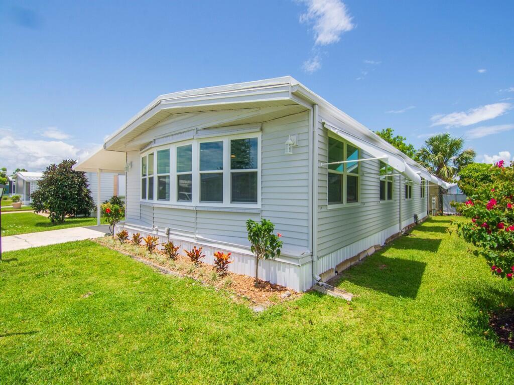 You gotta check this one out! Beautiful open living area with huge rooms. One of the largest homes in the park with tons of storage space. New AC unit. Pinelake Village is an active 55+ community located in Jensen Beach. Lot rent is only $765 per month which includes cable, trash removal, recycling and all the amenities of the clubhouse. Schedule your private tour today and discover the lifestyle you've been dreaming of!