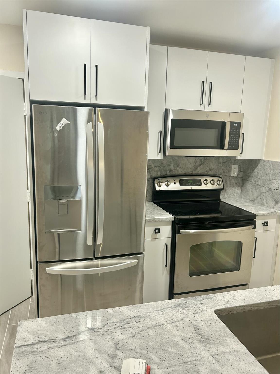 Welcome to comfort and convenience in the heart of Coral Springs! This beautifully renovated 1-bedroom, 1-bathroom condo in the desirable Tower Club community. Generously sized living and dining areas, updated kitchen features sleek stainless steel appliances, modern cabinetry, and plenty of counter space for all your cooking needs. The spacious bedroom offers ample space and a large closet, while the upgraded bathroom adds a fresh, contemporary touch.