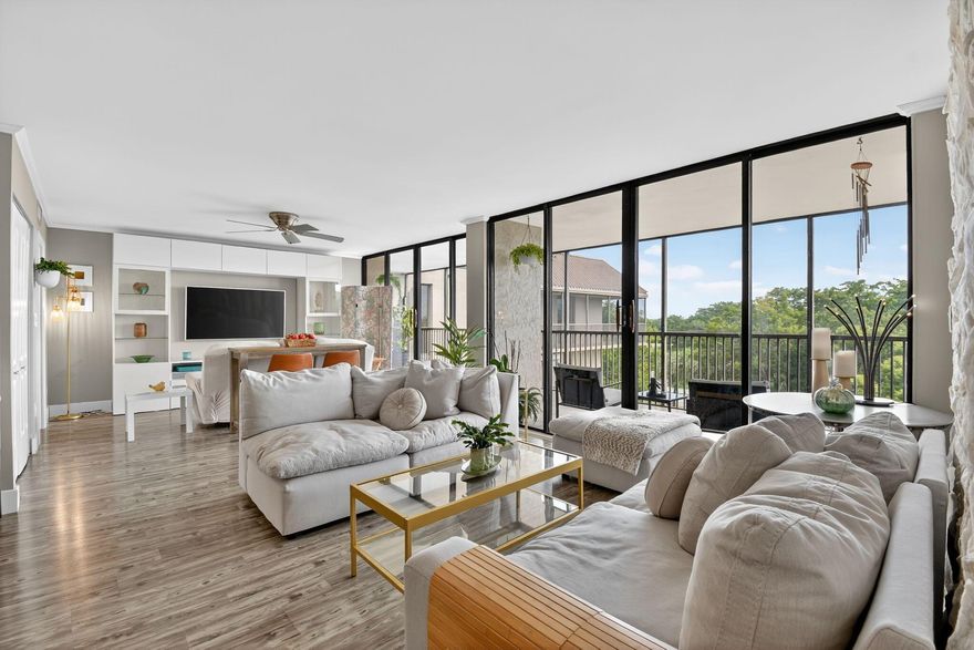 Experience elevated living at Grandview at Emerald Hills! RARELY AVAILABLE -This stunning penthouse  has 2-bed, 2.5-bath plus 3RD bonus room offering spacious comfort (almost 1900sqft) and style. Move in ready, under $470k! Enjoy a semi private entrance,an upgraded kitchen and floors, full-size washer & dryer, beautifully plastered ceilings with added insulation, and an extra freezer. No shared walls. The wrap-around balcony captures relaxing views and natural light throughout. Resort-style amenities include a clubhouse, billiards, library, fitness center, pool, spa/hot tub, and picnic area. Also includes 24 hour main gated security, one reserved parking space,water,sewer and trash. Seller will pay the $8K special assessment at closing. Furniture negotiable. ESA pets welcome!