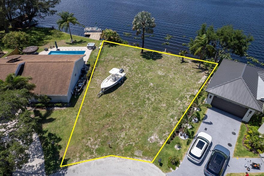 Tucked at the end of a quiet cul-de-sac within the desirable waterfront enclave of Island Estates, this unique lakefront homesite offers a rare chance to design something truly special. With 111± feet of direct waterfront and a 7,715 SF (0.1771 acre) footprint, the property invites a custom residence with room for dock that fully captures its expansive southwest exposure where open skies, shimmering water, and golden sunsets become part of everyday living. Lake Osborne is known for its recreational lifestyle, offering the freedom to boat, paddleboard, bass fishing, or simply unwind.  Just beyond your backyard, John Prince Park provides miles of trails, green space, and waterfront activities accessible by both land and water.   The setting strikes a perfect balance between tranquility and convenience. Beaches, including the Lake Worth Beach Pier, are only minutes away, while dining, shopping, and entertainment can be enjoyed in Downtown Lake Worth Beach, West Palm Beach, and Delray Beach along Atlantic Avenue. Easy access to Palm Beach International Airport ensures effortless travel. Island Estates is an intimate, low-HOA community where waterfront living takes center stage ideal for those seeking both privacy and connection to the best of Palm Beach County. Whether your vision is modern coastal, contemporary, or timeless estate living, this property is a blank canvas ready to be transformed. Secure your place on the water as opportunities with this much frontage and flexibility are few and far between.    All information is deemed reliable but not guaranteed. Buyer to verify all dimensions and details.