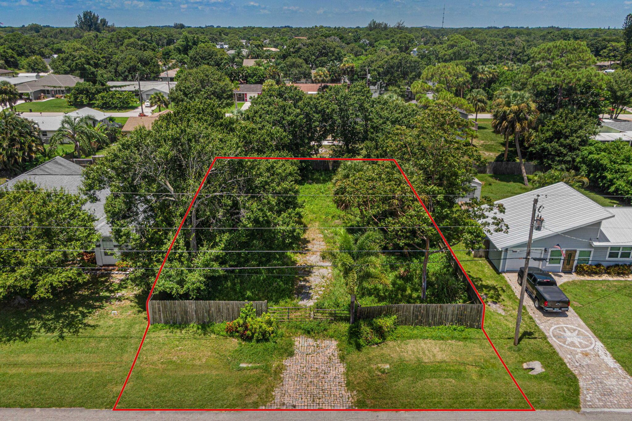 Discover the perfect canvas for your dream home! This exceptional vacant lot offers a blend of convenience and potential, providing a fantastic opportunity for those looking to build their ideal residence in a serene setting. This partially cleared lot is ready for your vision, featuring a well-maintained paver and gravel driveway that ensures easy access and a welcoming entrance. A fence surrounds the property for added privacy and protection! With utilities already in place, including prime locations for electric, well, and septic hookups, the groundwork for your new home is already laid out. The lot's partially cleared status offers a head start on construction, giving you the flexibility to design your home and outdoor space to your exact specifications. Schedule your showing today!
