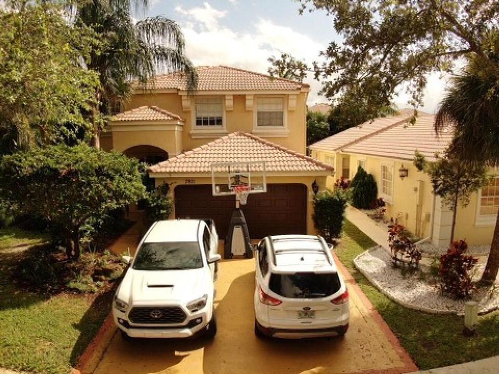 Photo of 7871 Oak Grove Circle Cir, Lake Worth Beach, FL 33467 (MLS # R10750856)