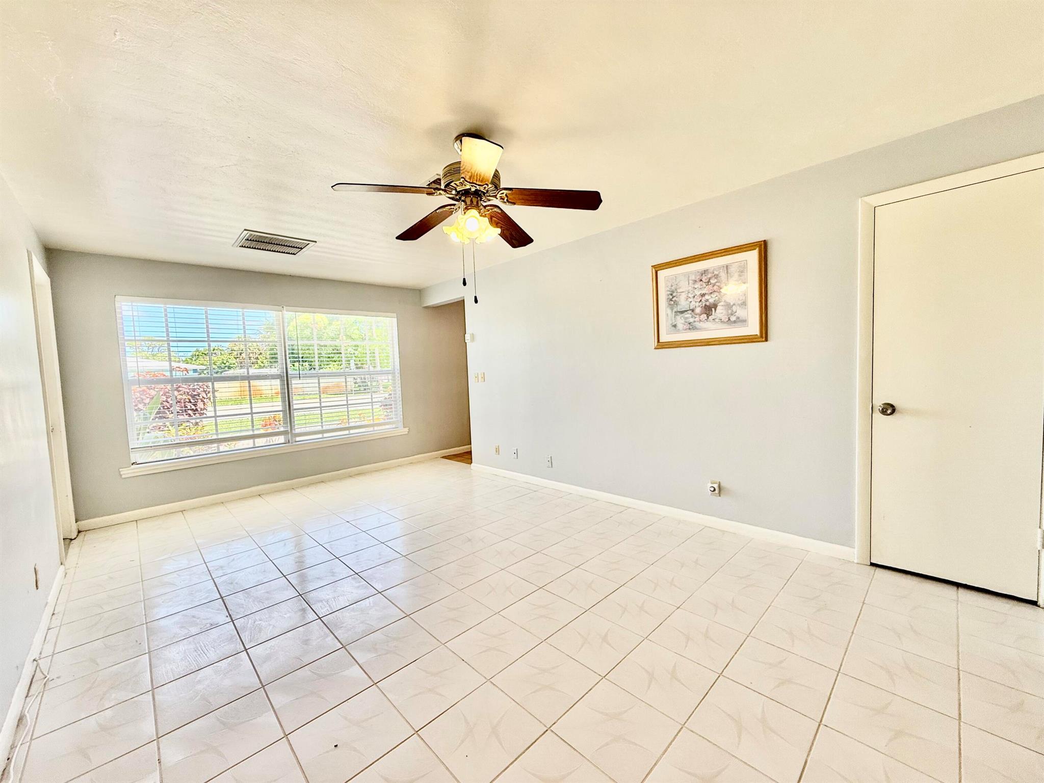 Look no further. This spacious home is tucked in a quiet neighborhood with an open front yard and a well shaded fenced backyard. Both bedrooms are great size with space for a home office or sitting area if desired. Space for two cars plus a covered spot under the attached carport. Landlord is providing landscaping services. Easy access to I95 and major roadways. Close to the best of Lake Park, North Palm, and Palm Beach Gardens.