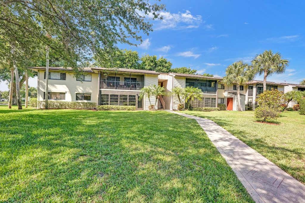 Photo of 15496 Lakes Of Delray Boulevard #101, Delray Beach, FL 33484 (MLS # R10990493)