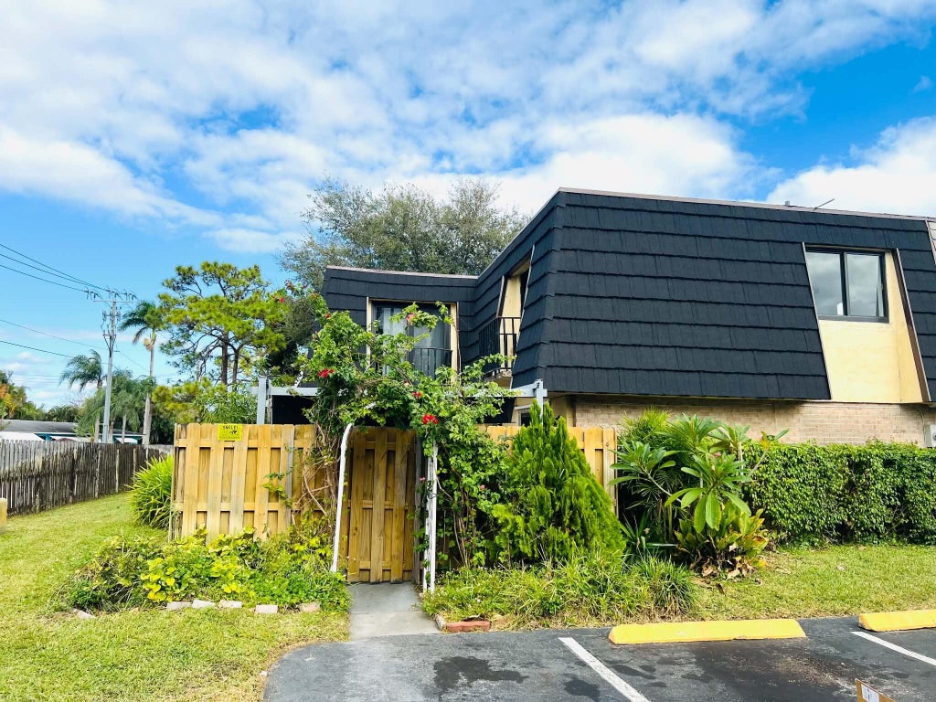Photo of 295 Woodland Road, Palm Springs, FL 33461 (MLS # B26074645)