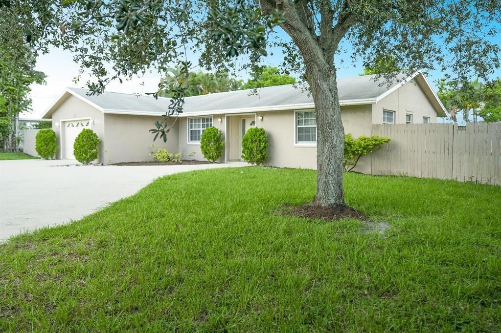 Photo of 3019 Seagrape Road, Lake Worth, FL 33462 (MLS # F10417155)