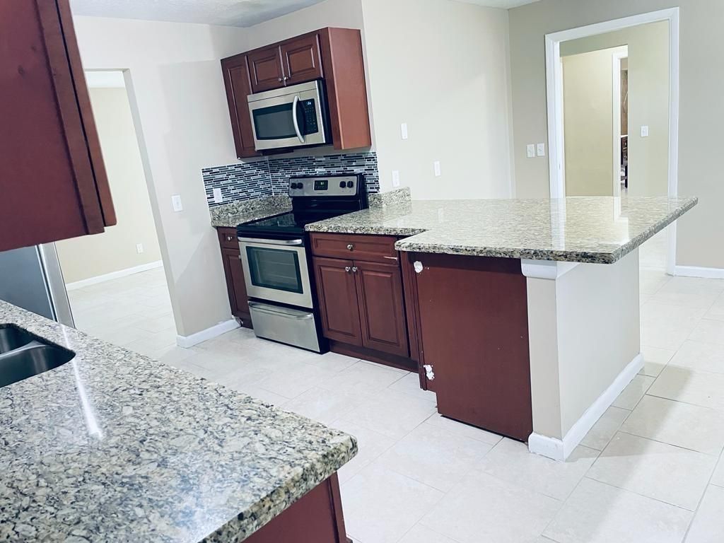 Photo of 3019 Seagrape Road, Lake Worth, FL 33462 (MLS # F10417155)