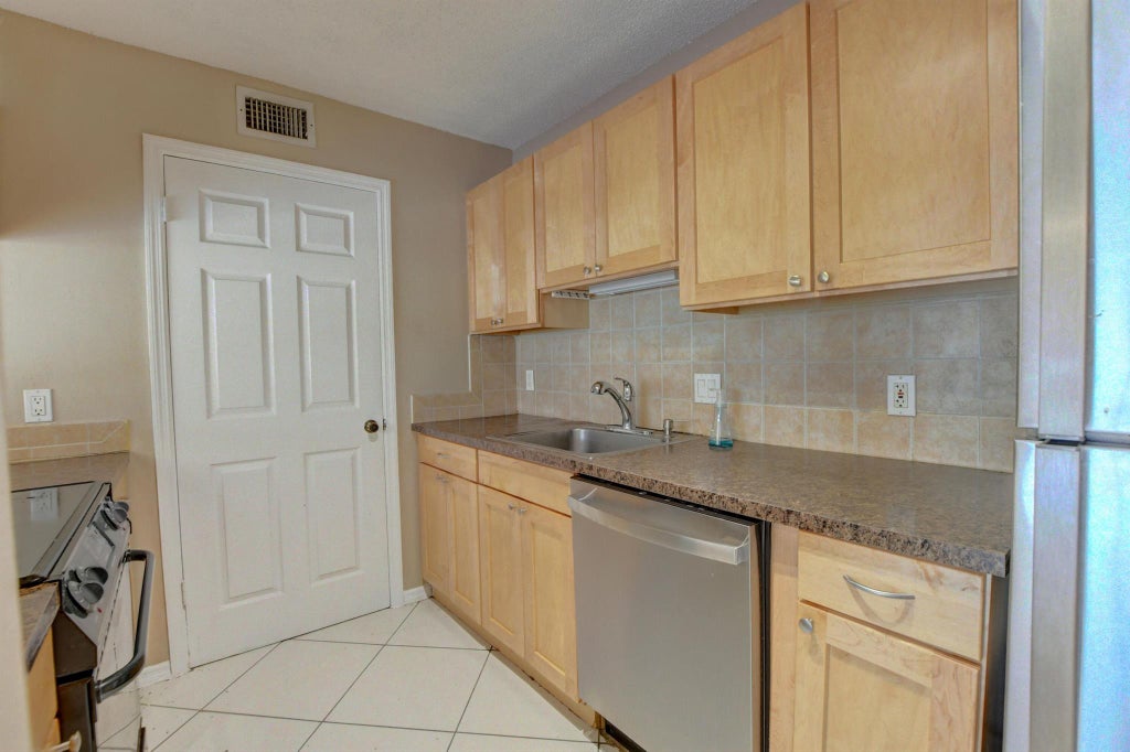 Photo of 2311 N Congress Avenue #15, Boynton Beach, FL 33426 (MLS # R10916271)